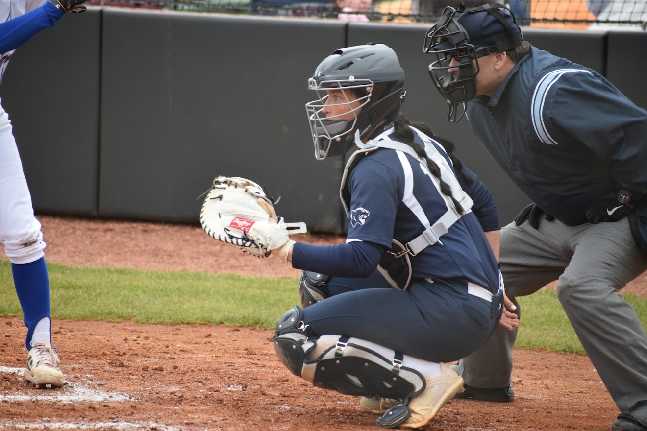 Softball catcher waits for pitch.