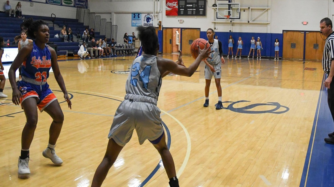 Defense and Key Scorers Power Lady Cougs to Victory